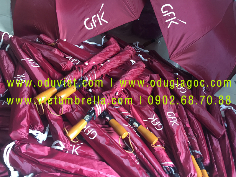 xưởng sản xuất ô dù cầm tay in logo quảng cáo